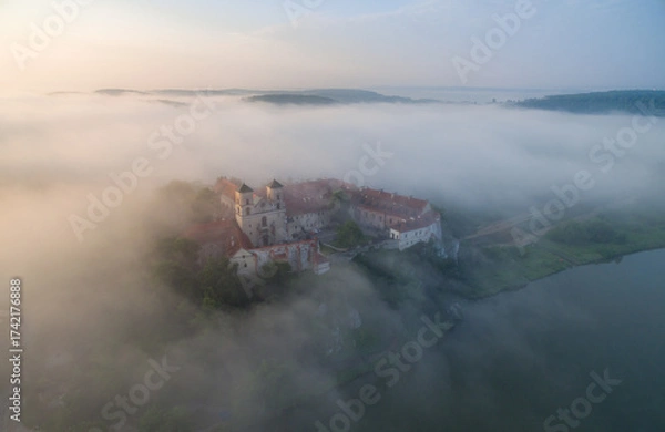 Fototapeta Aerial view of Tyniec abbey in the morning mists, beautiful sunrise, Krakow, Poland