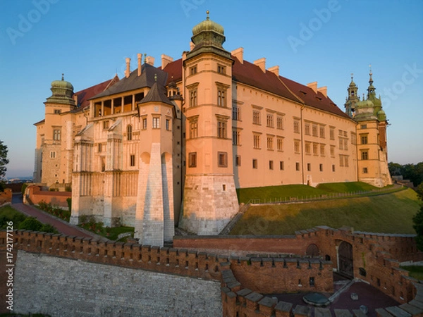Fototapeta Aerial view of Wawel castle and Wawel cathedral during golden hour in the morning, Krakow, Poland