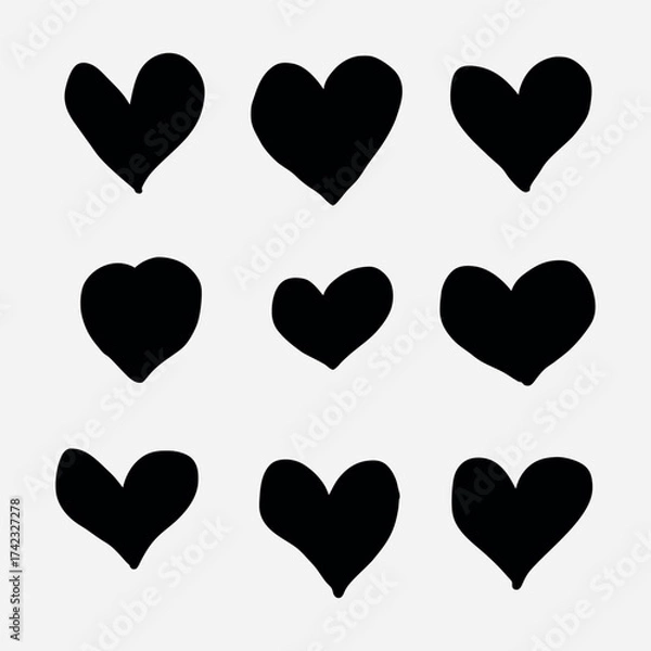 Fototapeta Collection of nine hand drawn black heart shapes on a white background.