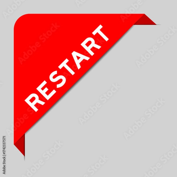 Fototapeta Red color of corner label banner with word restart on gray background