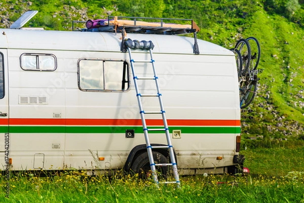 Fototapeta Caravan with ladder. Camper equipment.