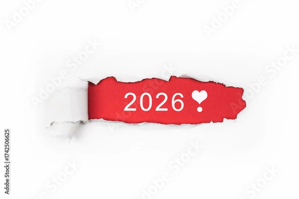 Fototapeta New Beginnings 2026: Torn Paper Revealing the Start of a New Year