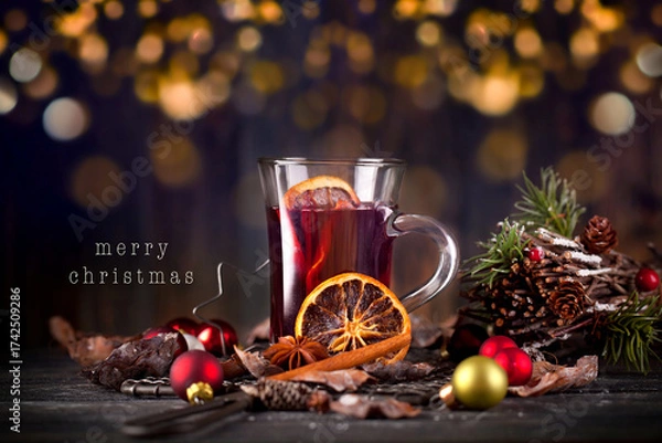 Fototapeta christmas still life with mulled wine and glimmering lights