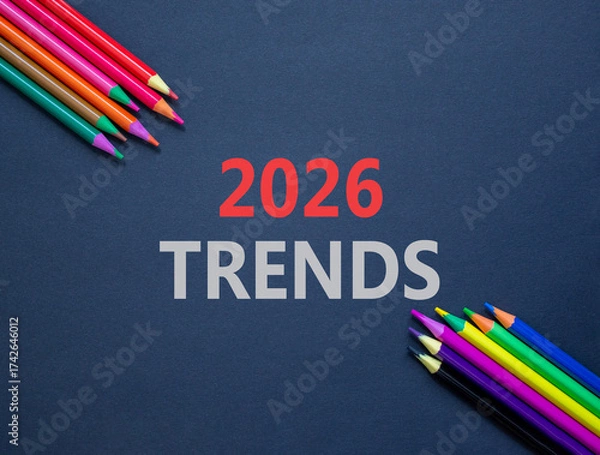 Fototapeta 2026 Trends new year symbol. Concept words 2026 Trends on beautiful black paper. Beautiful black paper background. Beautiful colored pencils. Business and 2026 Trends new year concept. Copy space.