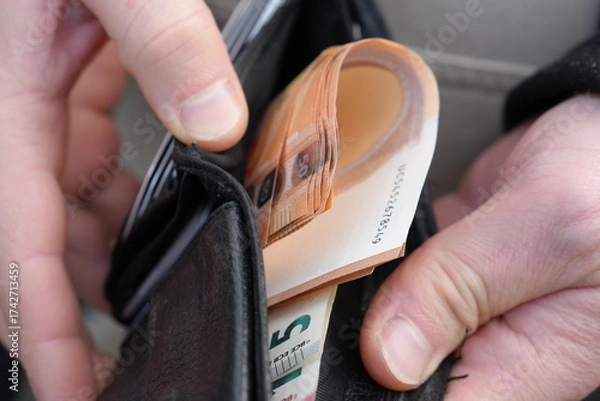 Obraz Hands Taking Euro Banknotes Out of a Wallet