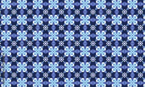 Fototapeta Snowflake winter geometric pattern. Winter holiday vector seamless ornament in blue colours for textile, fabric, interior, ceramic, wallpaper, paper decoration