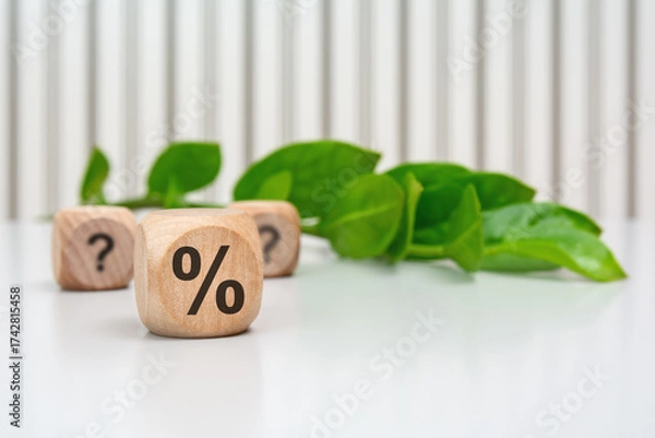 Fototapeta Wooden cube with percent symbol in focus