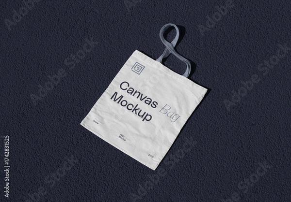 Fototapeta Lying on Concrete Canvas Bag Mockup