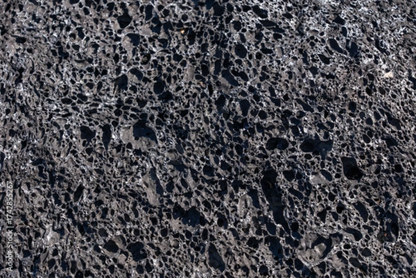 Fototapeta Basalt (Quaternary). Spatter Cones. Craters of the Moon National Monument & Preserve. Volcanic Field. Idaho's eastern Snake River Plain. Vesicular texture is a volcanic rock texture 