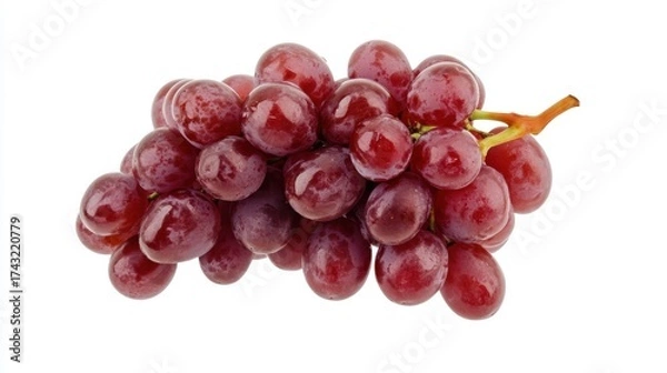 Fototapeta A cluster of fresh, plump red grapes, glistening with moisture, showcasing their vibrant color and natural appeal.