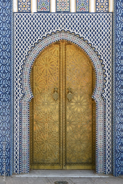 Fototapeta Brass door with Arabic calligraphy and Moroccan zellij mosaic tilework. Royal Palace, Fez, Morocco