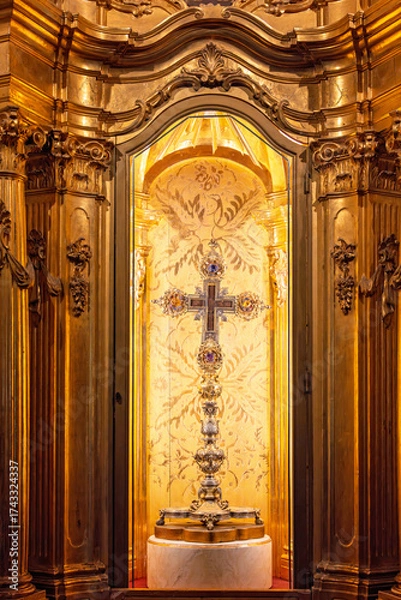 Fototapeta Religious cross in gold and jewels in a decorated cabinet in Palma Cathedral