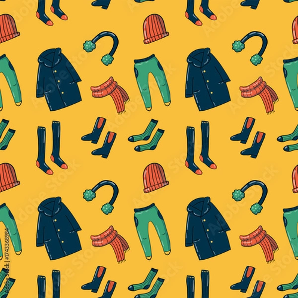 Obraz Set of warm clothing in doodle style, seamless pattern, hand-drawn illustration. Playful elements, Bright palette, joyful yellow background. Perfect for cozy autumn and winter seasonal projects.