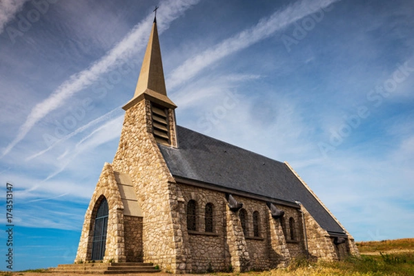 Fototapeta Notre-Dame-de-la-Garde Chapel on the top of the Amont Cliff, overlooking the city of Etretat, alabaster coast, department of Seine Maritime, Normandie region, France.