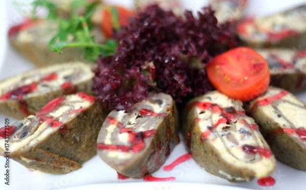 Fototapeta Crepes stuffed salad Fried rolled pancakes stuffed meat. Crepes stuffed with tuna, cucumber, eggs, arugula salad