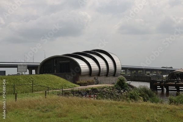 Fototapeta The bellows weir at Ramspol or Ramspolkering is an exceptionally large inflatable storm surge barrier