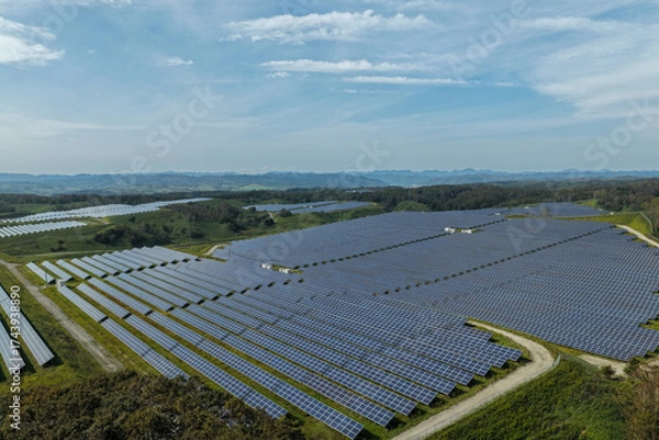 Fototapeta Aerial view of a large solar power plant in the Kushiro area, Hokkaido, Japan [EDITORIAL]