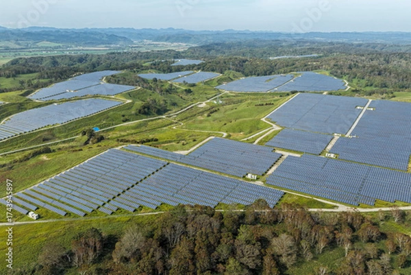 Fototapeta Aerial view of a large solar power plant in the Kushiro area, Hokkaido, Japan [EDITORIAL]