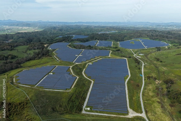 Fototapeta Aerial view of a large solar power plant in the Kushiro area, Hokkaido, Japan [EDITORIAL]