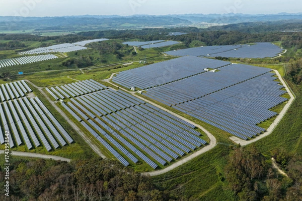 Fototapeta Aerial view of a large solar power plant in the Kushiro area, Hokkaido, Japan [EDITORIAL]