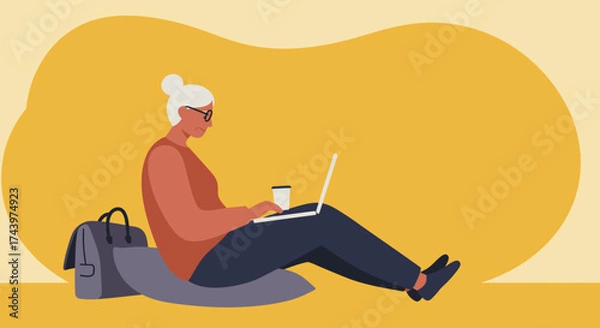 Fototapeta Senior woman using laptop for remote work or learning enjoying modern tech lifestyle