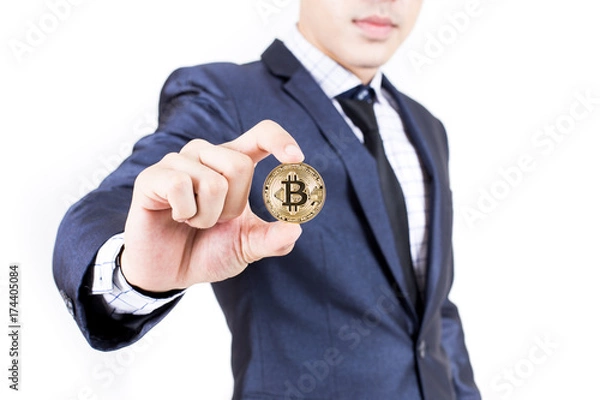 Fototapeta Businessman receive a lot of Money from Smartphone, Businessman Holding Bitcoin Isolated on white background, Digital Money and Bitcoine Concept.