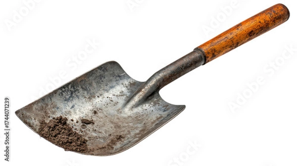 Obraz Rustic Shovel: This shovel, with its weathered metal and worn wooden handle, embodies the spirit of hard work and manual labor. The shovel with soil represents gardening and construction.