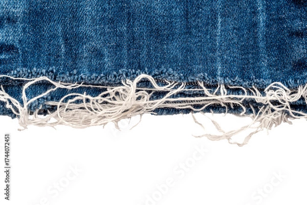 Fototapeta Piece of torn denim on a white background. Denim texture