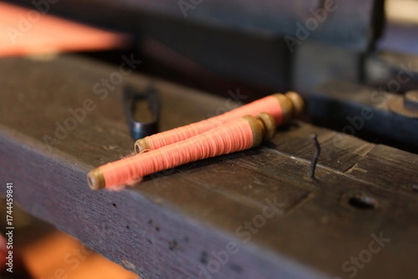 Fototapeta traditional silk production process carefully create silk fabric from start to finish. From spinning fine silk threads to weaving on wooden looms, this handmade craft reflects cultural heritage, skill