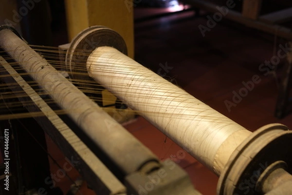 Fototapeta traditional silk production process carefully create silk fabric from start to finish. From spinning fine silk threads to weaving on wooden looms, this handmade craft reflects cultural heritage, skill