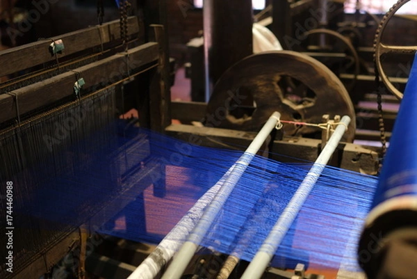 Fototapeta traditional silk production process carefully create silk fabric from start to finish. From spinning fine silk threads to weaving on wooden looms, this handmade craft reflects cultural heritage, skill