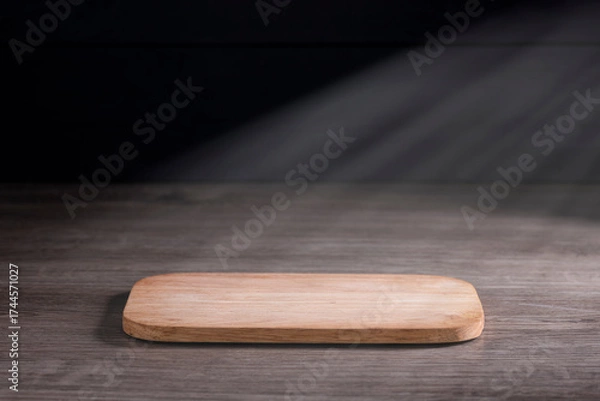 Fototapeta board Brown wooden floor in night atmosphere, dark background, light reflection on the floor, suitable for creating background images.