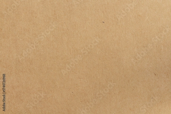 Fototapeta Cardboard sheet texture background, pattern of brown kraft paper with vintage style.