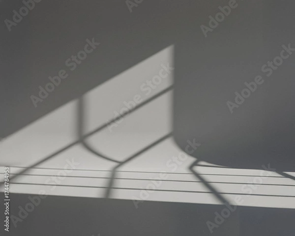 Obraz Abstract background featuring strong window shadows and geometric lines on a textured gray wall. High contrast creates a minimal, modern, and calm aesthetic, ideal for website backgrounds, product 