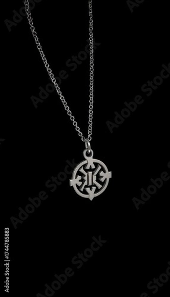 Obraz Silver pendant necklace with intricate design on black background  