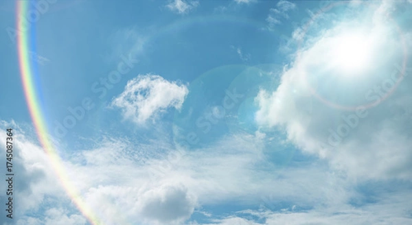 Obraz 夏の晴天、青空に流れる積乱雲ふわふわの入道雲と輝く太陽のレンズフレア 夏・夏休み・行楽・バカンス・アウトドア・キャンプ・天気・台風一過・紫外線・日焼け 秋・秋晴れ