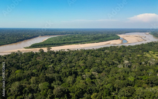 Fototapeta AERIAL VIEW OF THE MADRE DE DIOS RIVER NEAR THE TAMBOPATA NATIONAL RESERVE, BIODIVERSITY AND LARGE TREES AND RAINFORESTS OF THE AMAZON