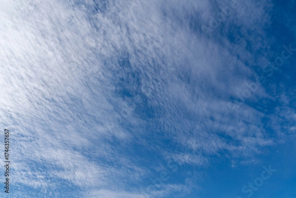 Obraz A blue sky lightly covered with thin clouds in Fukuoka prefecture, JAPAN.