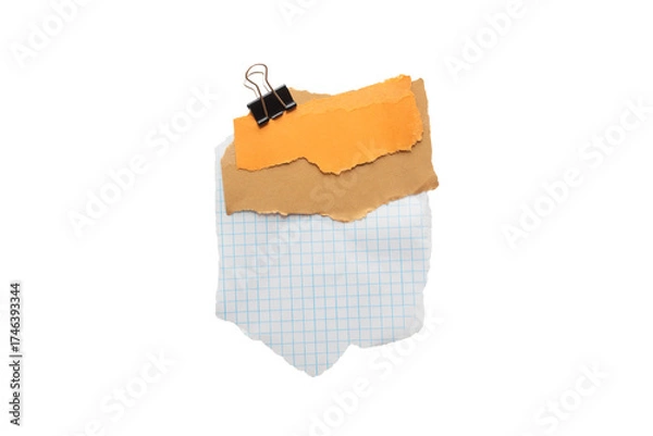 Fototapeta Torn piece of brown and yellow piece of paper with beige tape and black binder isolated on white background