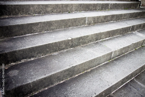 Fototapeta Detail of an old stone staircase