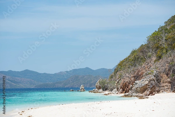 Fototapeta  a breathtaking view of a secluded tropical pristine beach on a sunny day