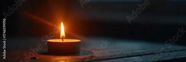 Fototapeta Burning Candle Flame in Dark Room Introspection, Peace, and Self-Discovery