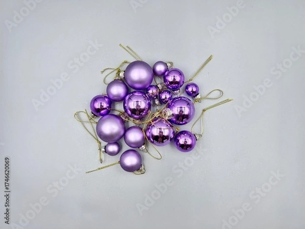 Obraz Christmas decorations scattered across the surface, close-up view from above, against a light background