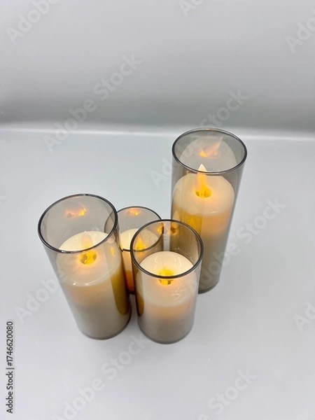 Obraz Electronic candles on a light background, Christmas decoration