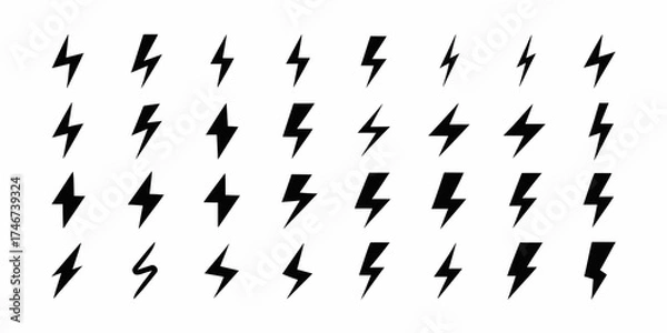 Fototapeta Collection of black lightning bolt icons and symbols on a white background representing energy and power