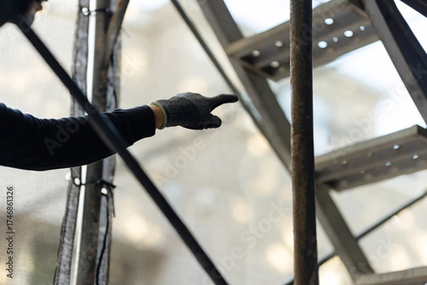 Obraz 建築現場で働く男性