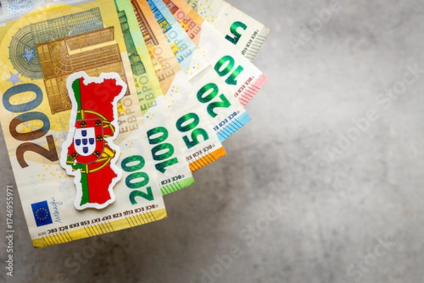 Fototapeta Portugal money and national emblem, Gray background, copy space, flat lay, Financial background, Euro banknotes
