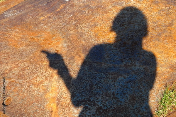 Obraz Shadowy Figure Pointing Left