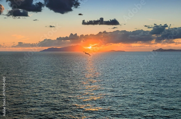 Fototapeta View of the Gulf of Naples with the Phlegraean Islands at sunset in southern Italy.