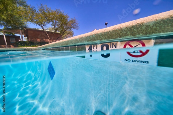 Fototapeta Split Perspective Swimming Pool Water Depth and Neighborhood Summer Relaxation